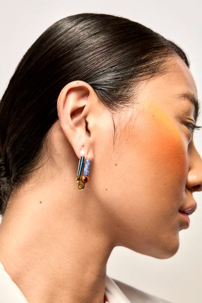 Model Wears Bianca Mavrick Jewellery Safety Pin Earrings Gold Tiger Eye